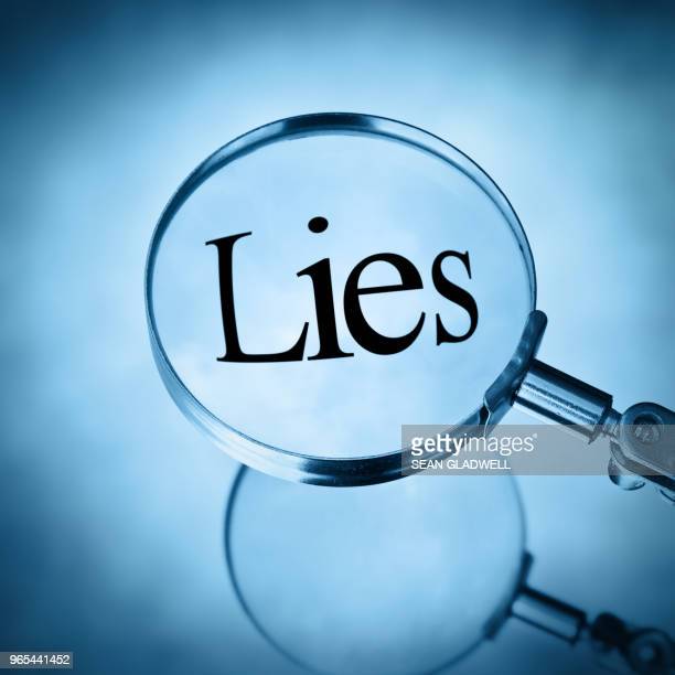 Magnifying glass with the word lies magnified in square format in blue